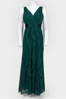 Evening emerald dress in the floor with tag