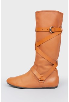 Brown leather boots with metal buckle