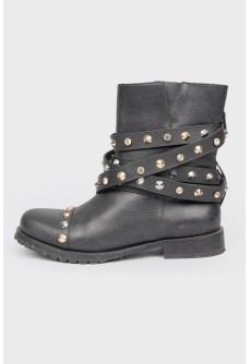 Boots with metal spikes