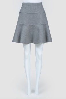 Gray woolen skirt with a shuttle