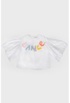 Children\'s white blouse with colored appliqué