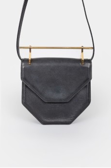 Leather curly bag with a metal handle