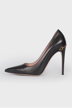 Black leather stilettos with a sharp toe