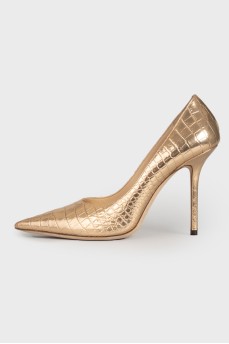 Golden shoes with embossed crocodile