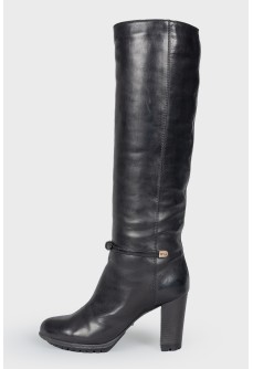 Tall black leather boots