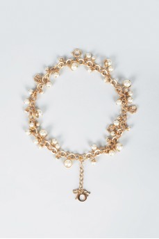 Golden bracelet with pearls