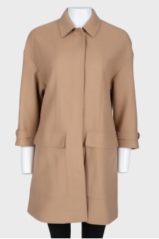 Light brown coat with gold buttons