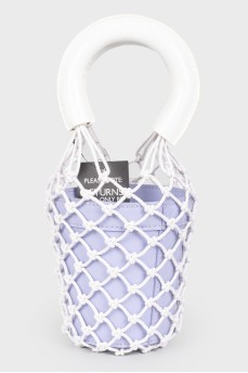 A purple bag with a net and white handles, there is a tag