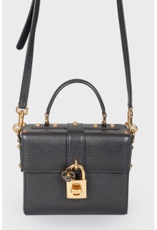 Black leather rectangular bag with a golden lock
