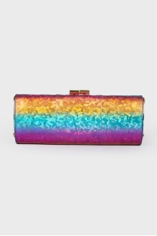 Multi -colored clutch on a fastener from a brand logo