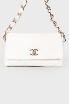 White handbag with a log of brand