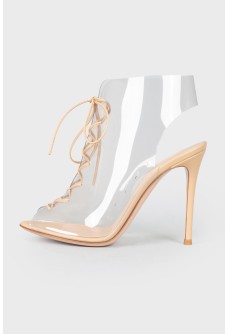 Transparent stiletto heels, with a tag