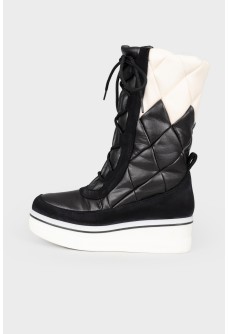 Quilted eco-leather boots with tag