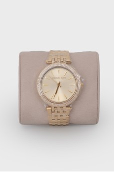 Gold watch with tag