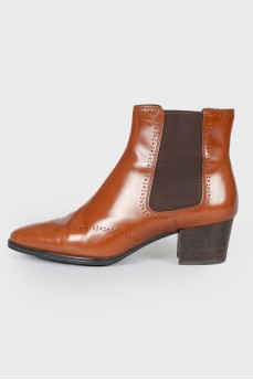 Perforated leather ankle boots