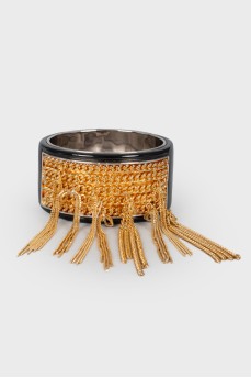 Bracelet with a golden insert, with a tag