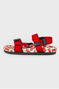 Children's red sandals with a tag