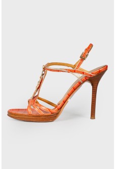 Coral sandals with reptile embossing