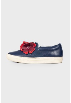 Leather slip-ons with floral appliqué