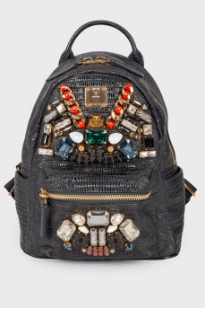 Backpack with an applique of rhinestones