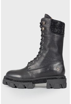 Leather boots with rhinestones and tag
