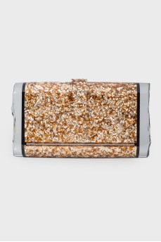 Golden clutch with transparent inserts