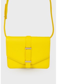 Bright yellow bag on the shoulder belt