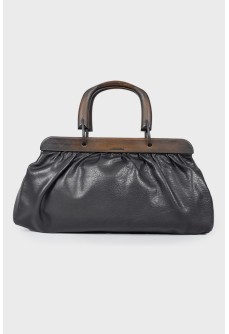 Leather bag with wooden handles