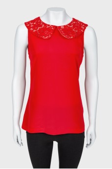 Red top with a lace collar