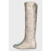 Boots embossed with snakeskin