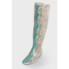 Boots embossed with snakeskin