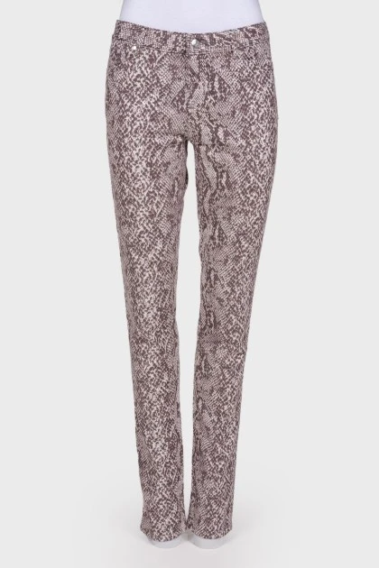 Skinny jeans with a snakeskin print