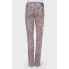 Skinny jeans with a snakeskin print