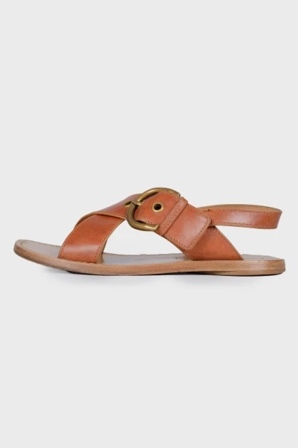 Leather sandals with a buckle