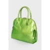 Light green bag with textured embossing
