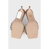 Heeled mules in mocha color