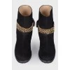 Leather boots with a gold chain