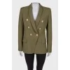 Green jacket with textured buttons