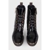 Patent black lace-up boots