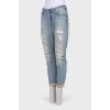 Jeans with the effect of torn and shabby