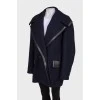 Blue coat with leather inserts