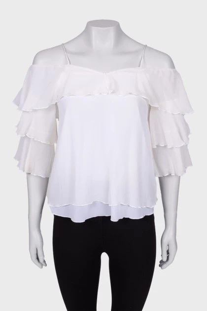 White top with frills