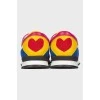 Colored sneakers with heart-shaped inserts