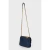 Leather blue tote bag with metal decor