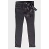Black jeans with textile belt