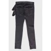 Black jeans with textile belt