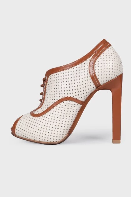 Perforated peep toecap ankle boots