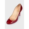 Red patent heel pumps