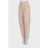 Velor beige trousers with tag