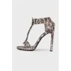 Sandals with snakeskin effect